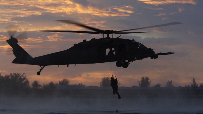 Alex Quade being retrieved in an exercise with 38th Rescue Squadron and Army Special Forces.
