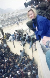 Crowds can quickly turn into riots. CNN correspondent Alex Quade covering Kabul, Afghanistan 2001/2002.  Photo: Courtesy CNN